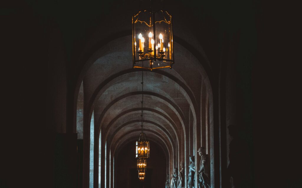 Spooky dark corridor of the chateau of Versailles