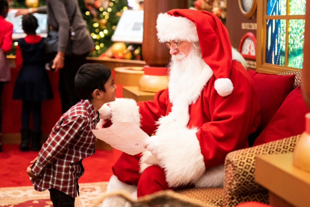 boy with santa and letter